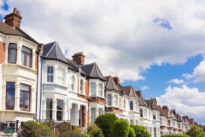 Row of traditional Victorian terraced houses in the UK, representing rental and buy-to-let investment opportunities in Leeds and Birmingham.