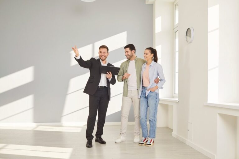Couple viewing a property with an estate agent while preparing for new landlord compliance rules under the Renters’ Rights Act from 27 December 2025.