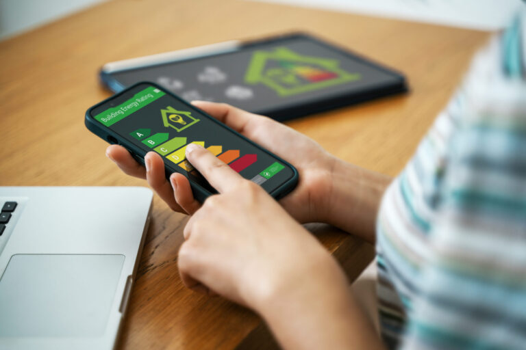 Buyer reviewing an EPC energy efficiency rating on a smartphone while house hunting in Pontefract