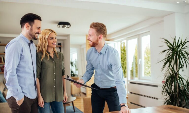 Letting agent advising landlords inside a rental property as they grow a compliant portfolio in West Derby