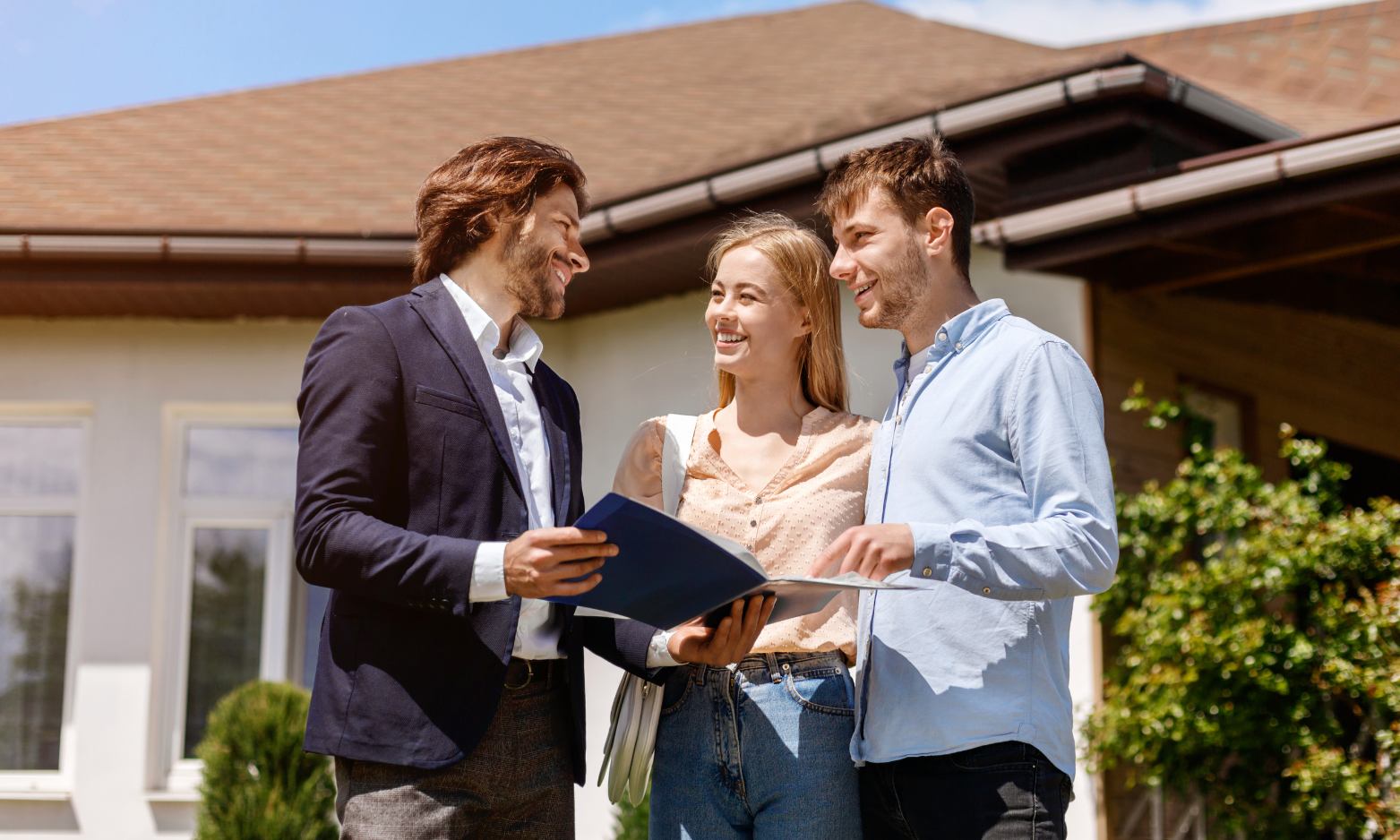 Pontefract estate agent discussing a rental home with tenants