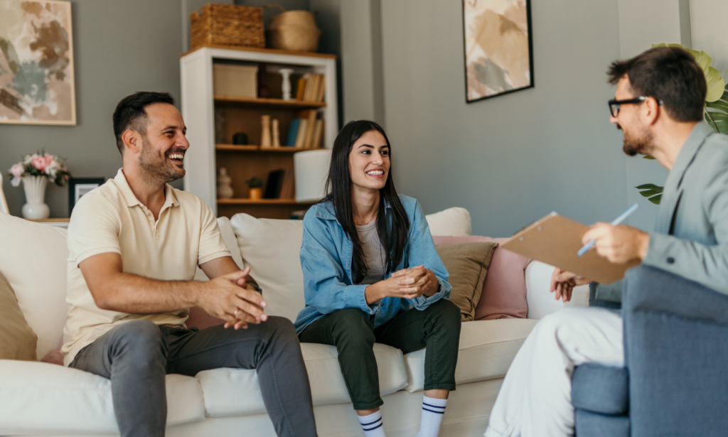 Tenants discussing an Old Swan rental property with a letting agent