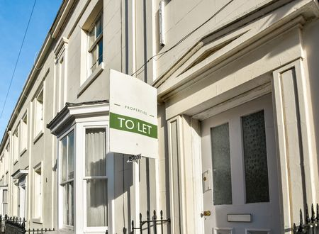 To let sign outside a row of residential houses