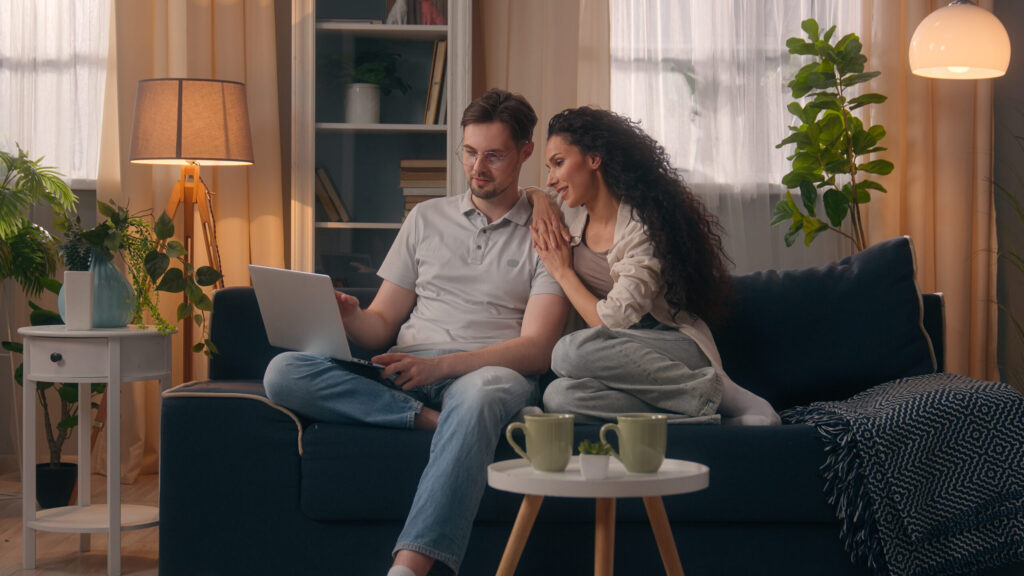 Couple researching the Swanside L14 property market