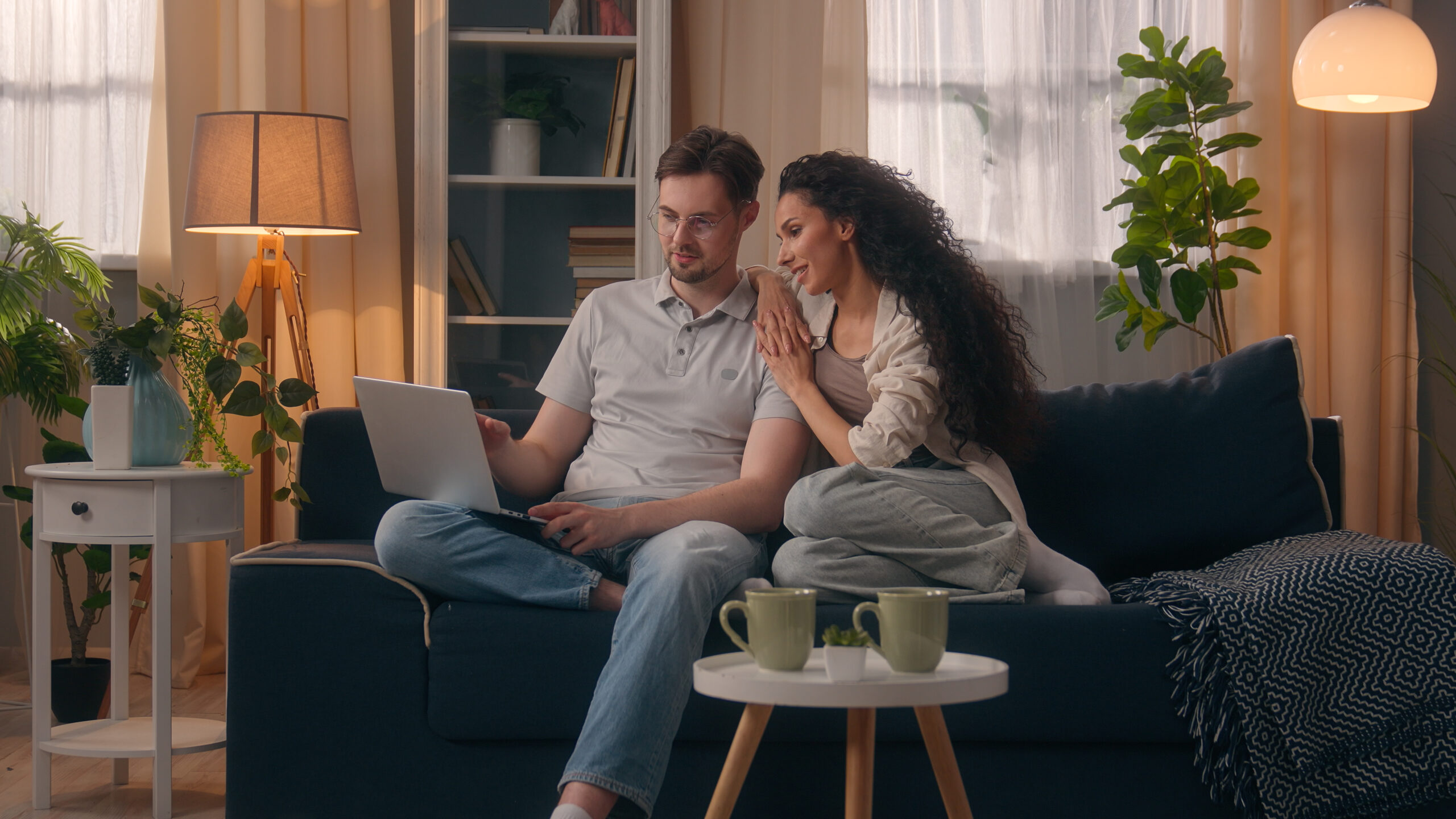 Couple researching the Swanside L14 property market